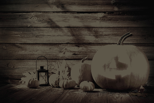 Duża dynia pilnuje mniejszych dyń